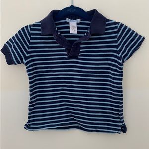 Blue striped polo shirt.